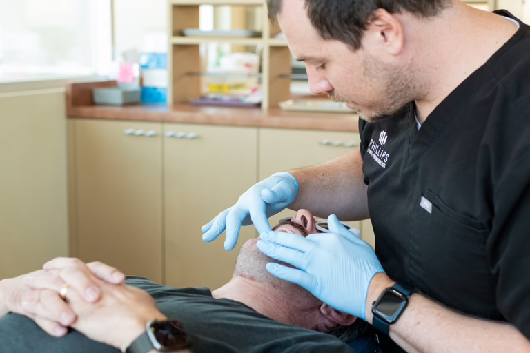 Patient getting braces learning what to expect with braces and how to take care of braces