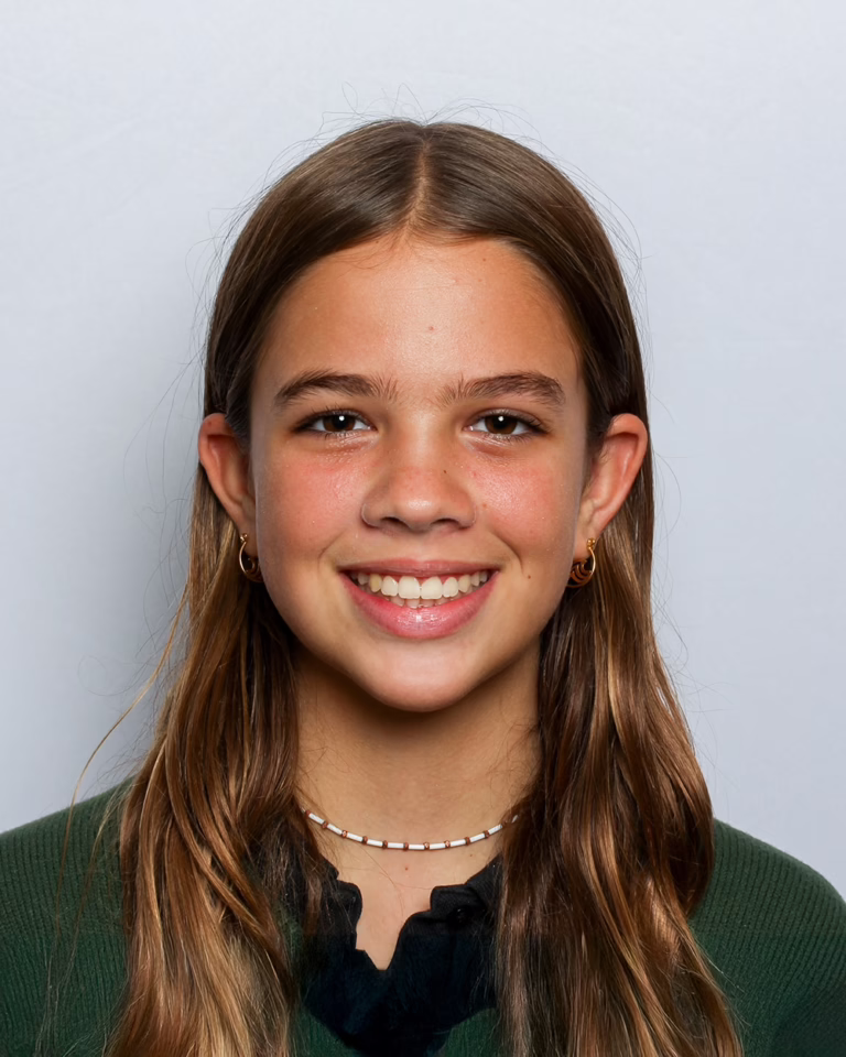 Smiling girl patient after braces in Encinitas California with Dr. Joseph Phillips