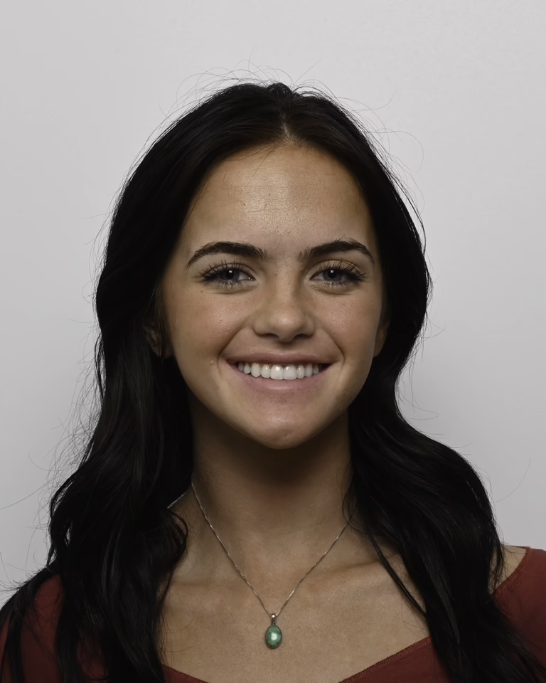 Smiling woman after treatment with Dr. Joseph Phillips in Encinitas, North County, California