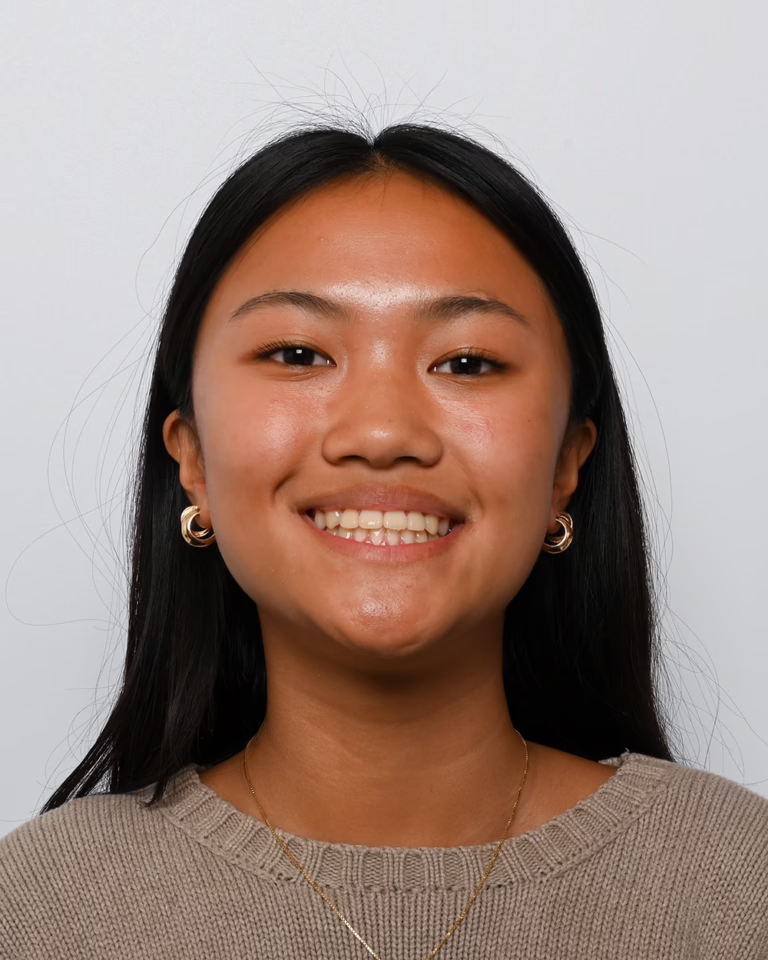 Female patient of Doctor Joseph Phillips smiling after braces in San Diego California